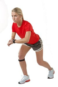 Runner wearing the Cho-Pat Original Knee Strap