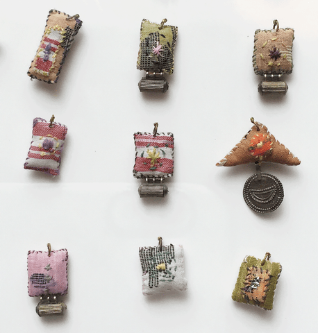 amulets made from scrap fabric