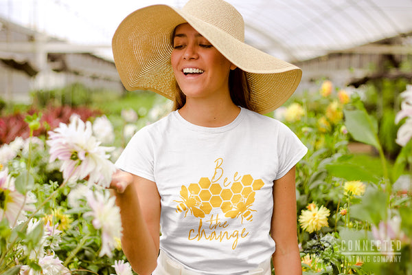 Model Wearing chinesemandaringarden Bee The Change Tee in White - chinesemandaringarden - Ethically and Sustainably Made - 10% donated to The Honeybee Conservancy