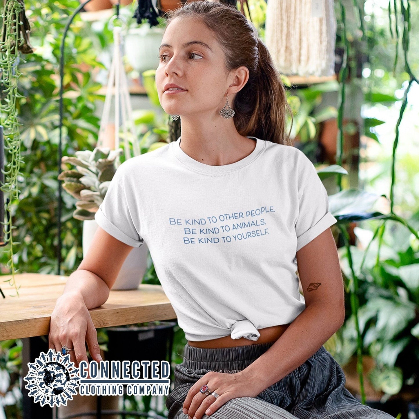 Model Wearing White Be Kind To All Short-Sleeve Tee - sweetsherriloudesigns - 10% of profits donated to ocean conservation