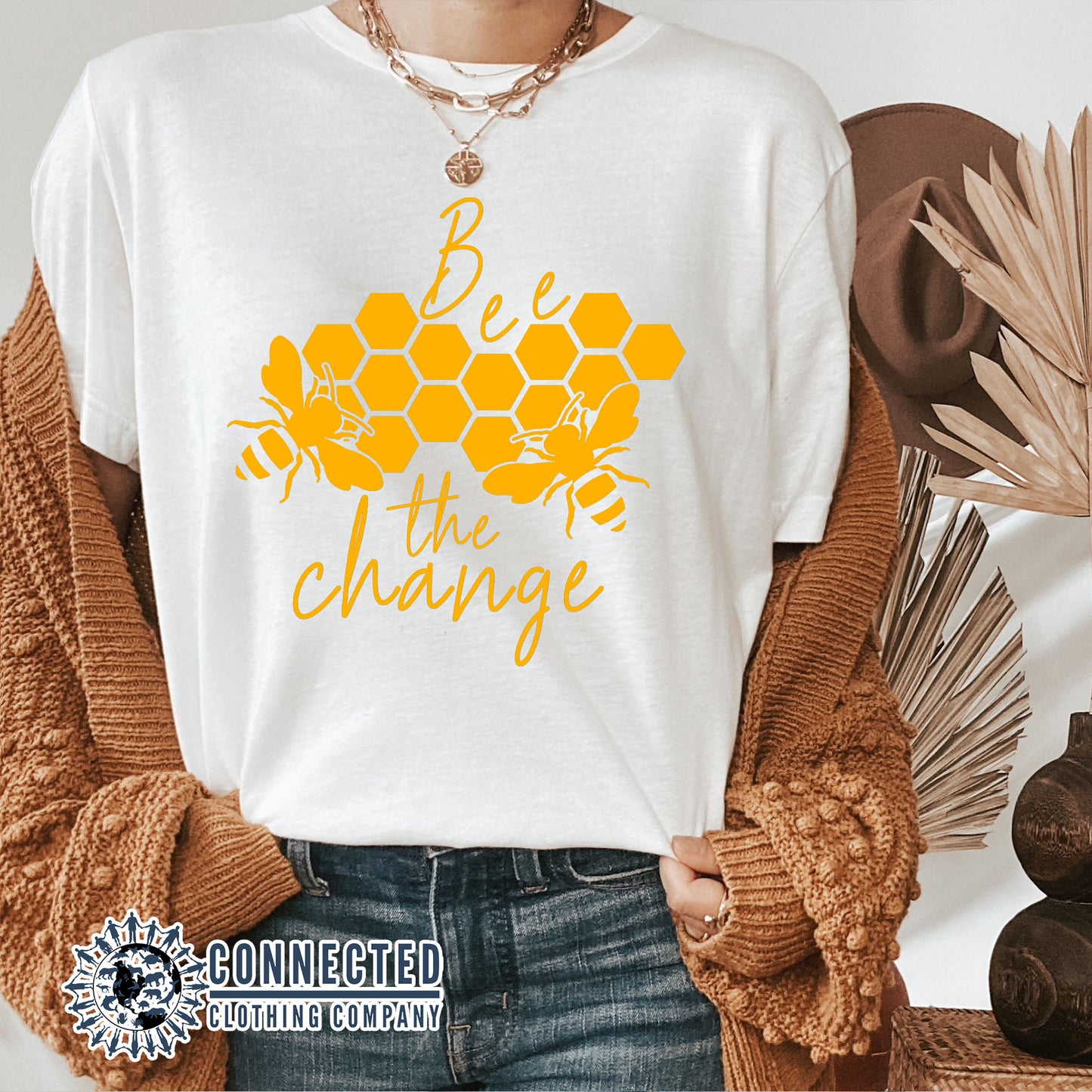 Model Wearing White Bee The Change Short-Sleeve Tee - sweetsherriloudesigns - 10% of profits donated to the Honeybee Conservancy