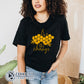 Model Wearing Black Bee The Change Unisex Short-Sleeve Tee - sweetsherriloudesigns - 10% of profits donated to the Honeybee Conservancy