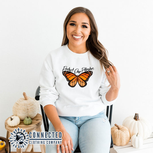 Model Wearing White Protect Our Pollinators Crewneck Sweatshirt - sweetsherriloudesigns - Ethically and Sustainably Made - 10% of profits donated to pollinator and monarch conservation and ocean conservation