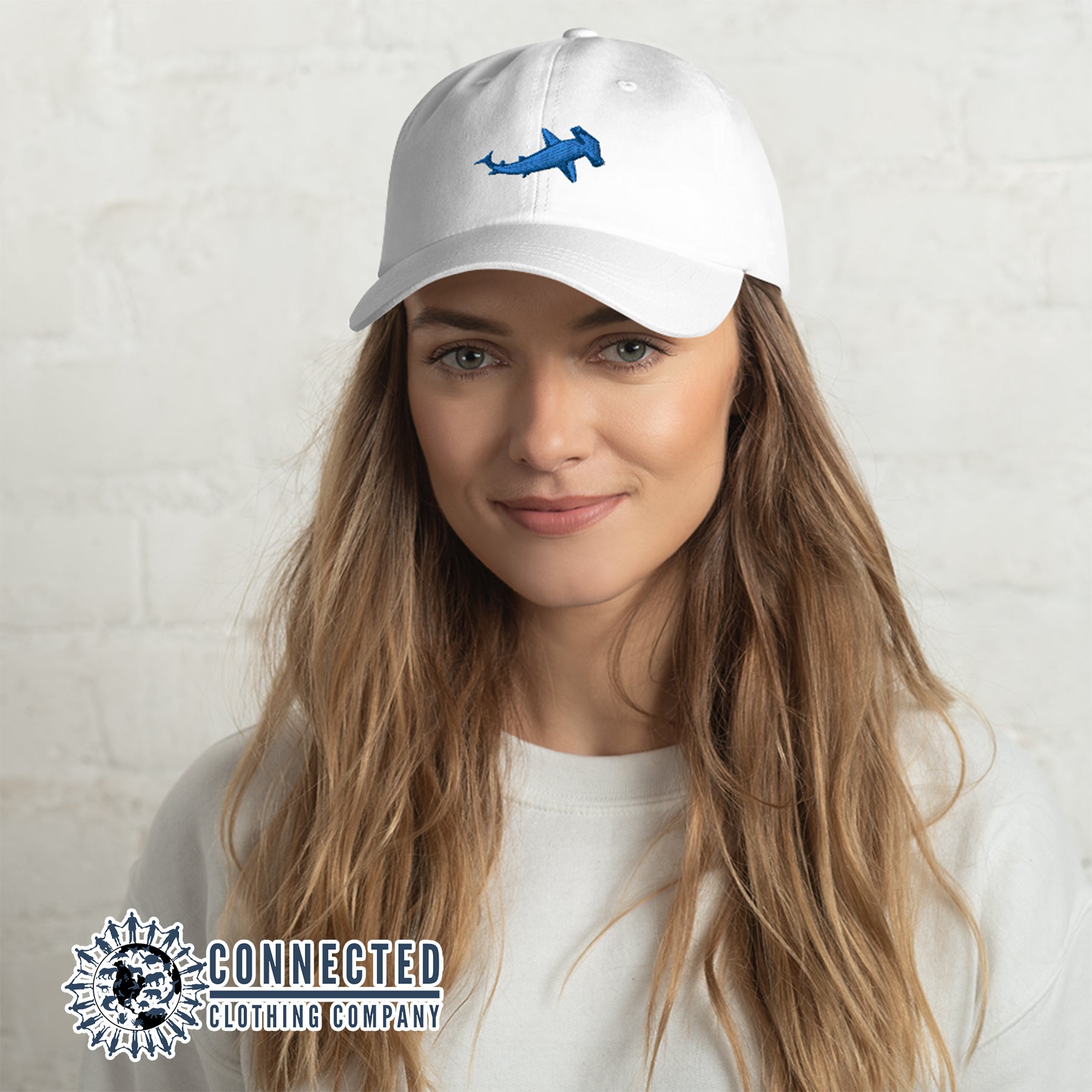 Model Wearing White Hammerhead Shark Cotton Cap - sweetsherriloudesigns - Ethical & Sustainable Clothing That Gives Back - 10% donated to Oceana shark conservation