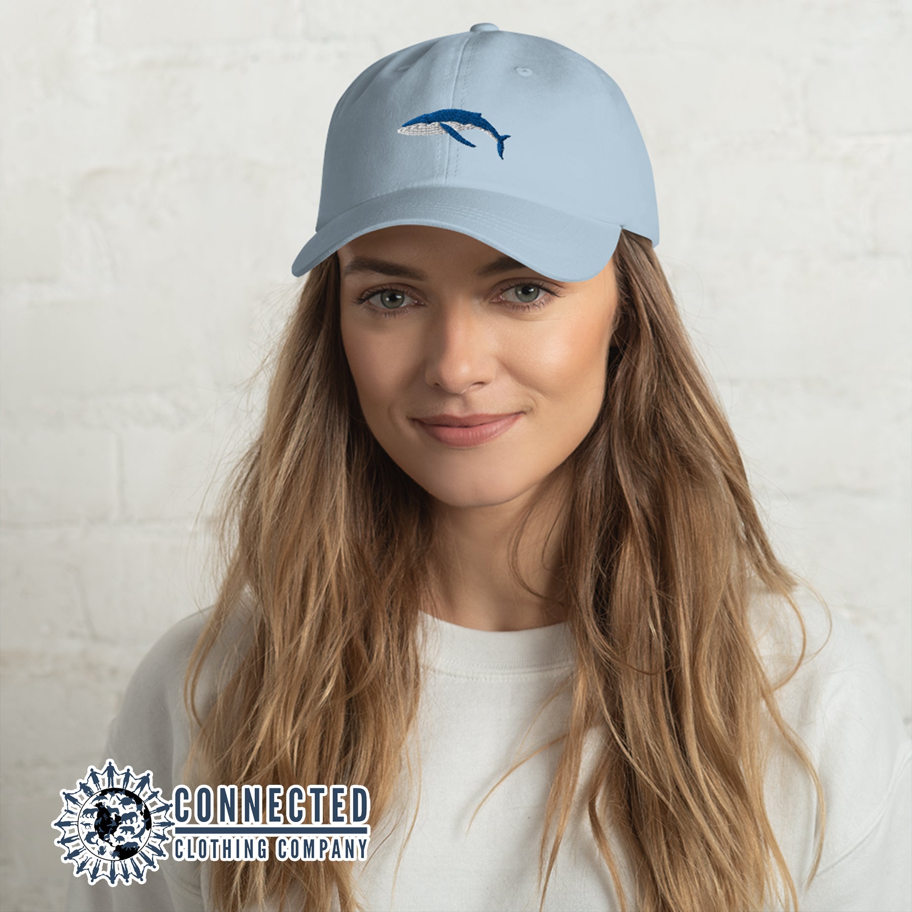 Model Wearing Blue Humpback Whale Cotton Cap - sweetsherriloudesigns - 10% of profits donated to Mission Blue ocean conservation