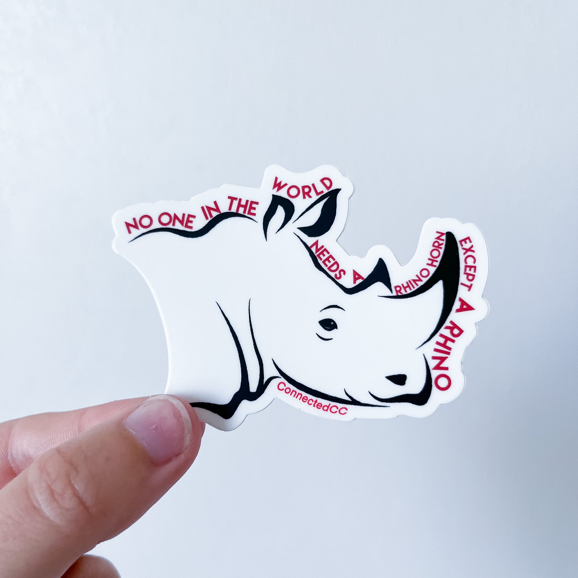 White No One Needs A Rhino Horn Sticker reads "No One In The World Needs A Rhino Horn Except A Rhino" - sweetsherriloudesigns - Ethically and Sustainably Made - 10% donated to Save The Rhino International