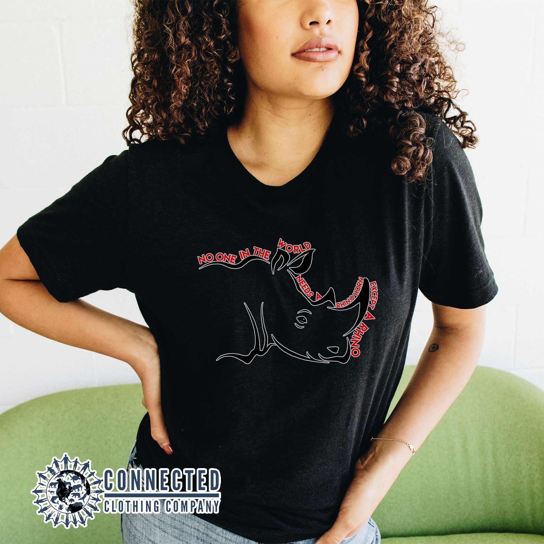 No One Needs A Rhino Horn Tee reads "No One In The World Needs A Rhino Horn Except A Rhino" - sweetsherriloudesigns - Ethically and Sustainably Made - 10% donated to Save The Rhino International