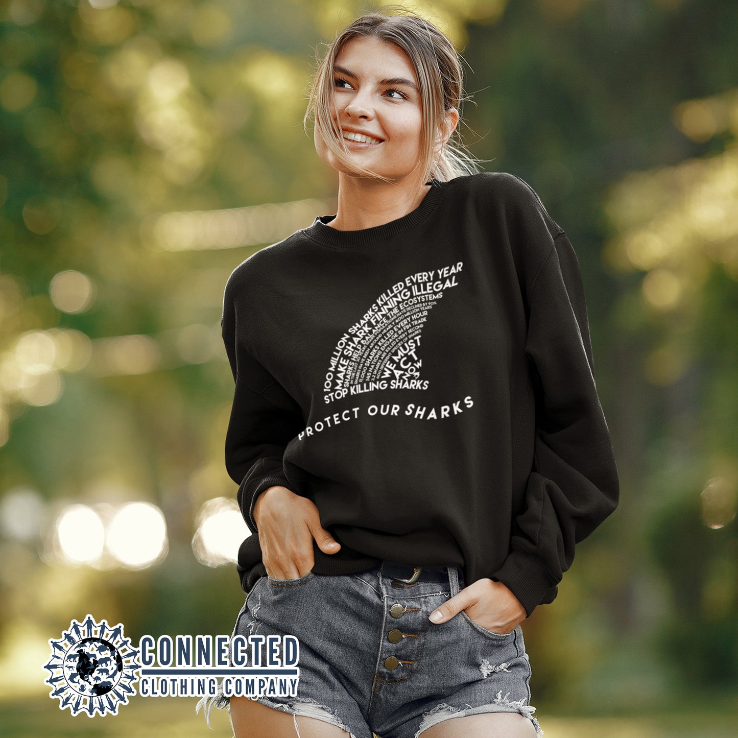 Model Wearing Black Protect Our Sharks Unisex Crewneck Sweatshirt - architectconstructor - Ethically and Sustainably Made - 10% of profits donated to shark conservation and ocean conservation