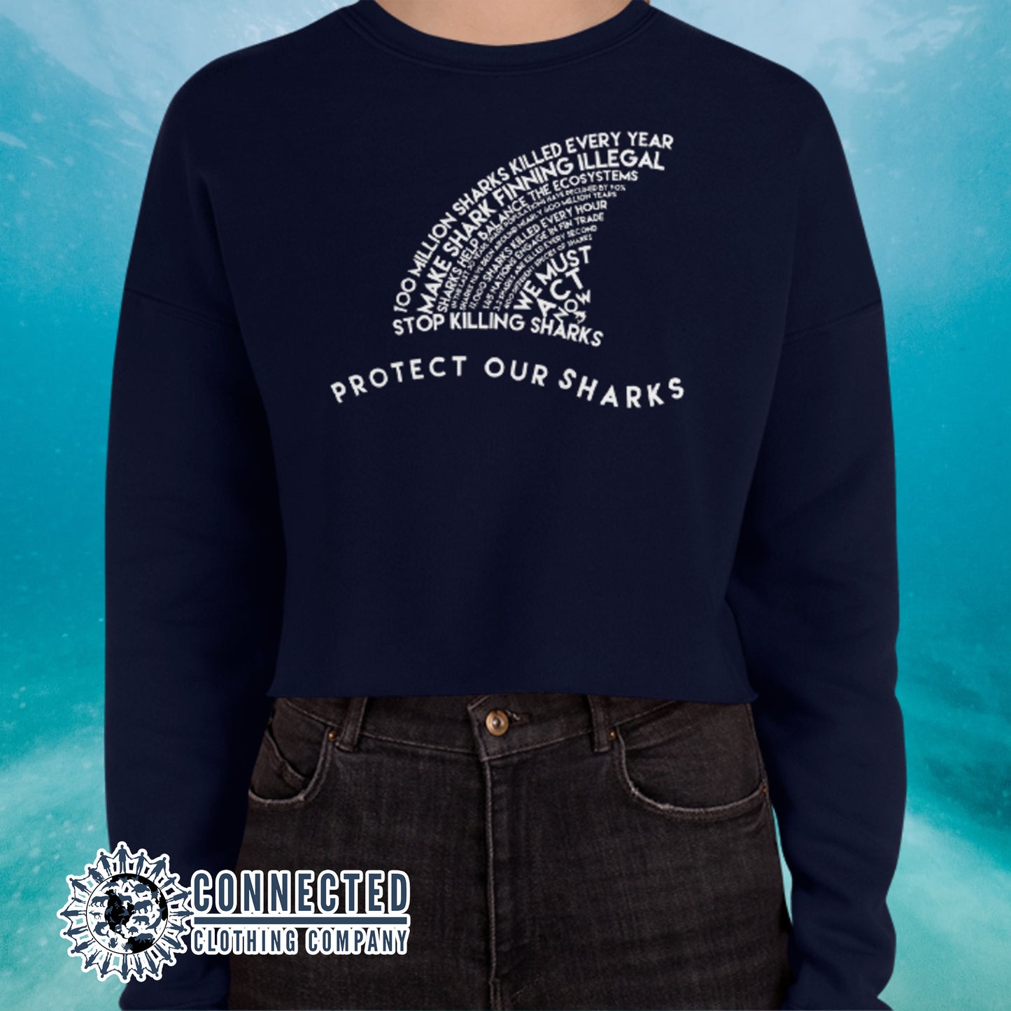 Model Wearing Navy Protect Our Sharks Crop Sweatshirt - sweetsherriloudesigns - Ethically and Sustainably Made - 10% of profits donated to shark conservation and ocean conservation