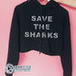 Hand Holding Black Save The Sharks Crop Hoodie - sweetsherriloudesigns - Ethically and Sustainably Made - 10% donated to Oceana shark conservation