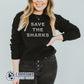 Model Wearing Black Save The Sharks Unisex Crewneck Sweatshirt - sweetsherriloudesigns - Ethically and Sustainably Made - 10% of profits donated to shark conservation and ocean conservation