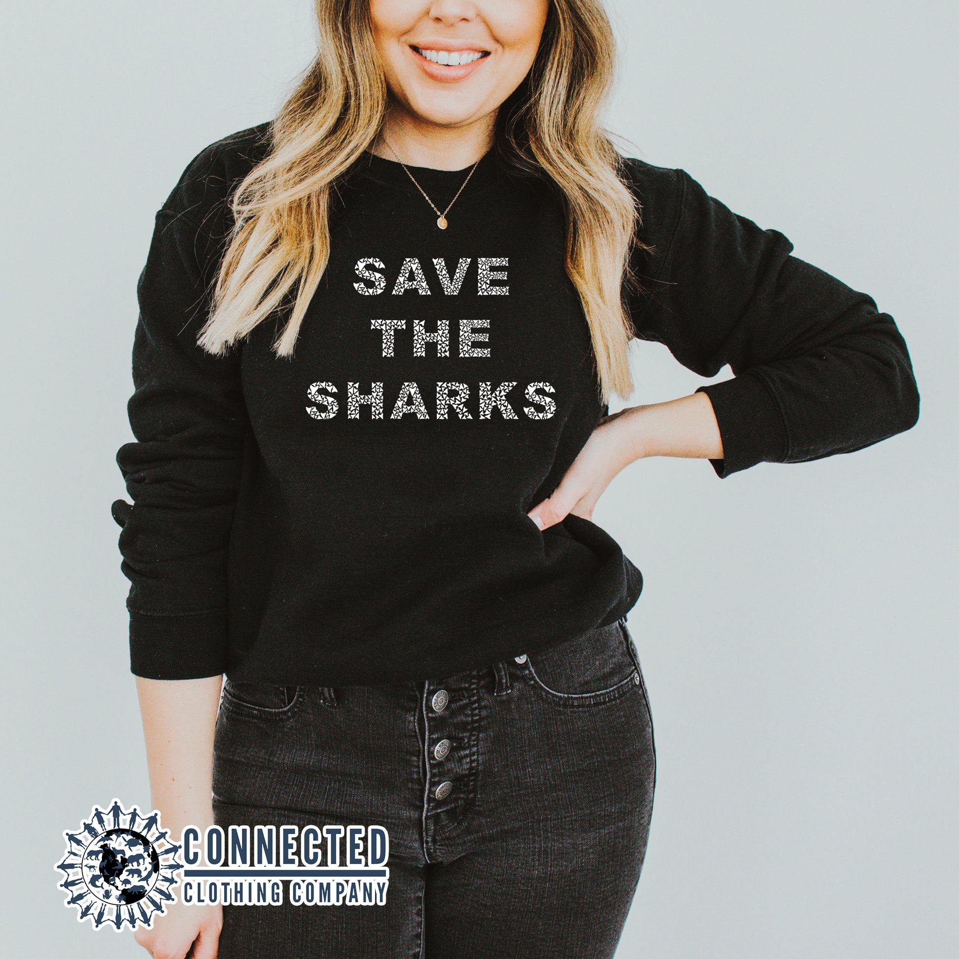 Model Wearing Black Save The Sharks Unisex Crewneck Sweatshirt - sweetsherriloudesigns - Ethically and Sustainably Made - 10% of profits donated to shark conservation and ocean conservation