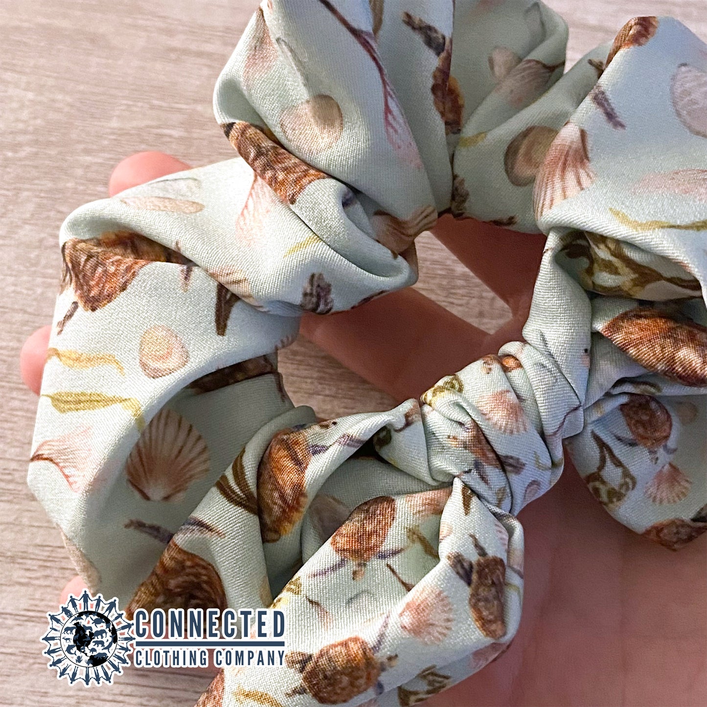 Hand Holding Sea Turtle Scrunchie - sweetsherriloudesigns - Ethical & Sustainable Apparel - 10% donated to save the sea turtles