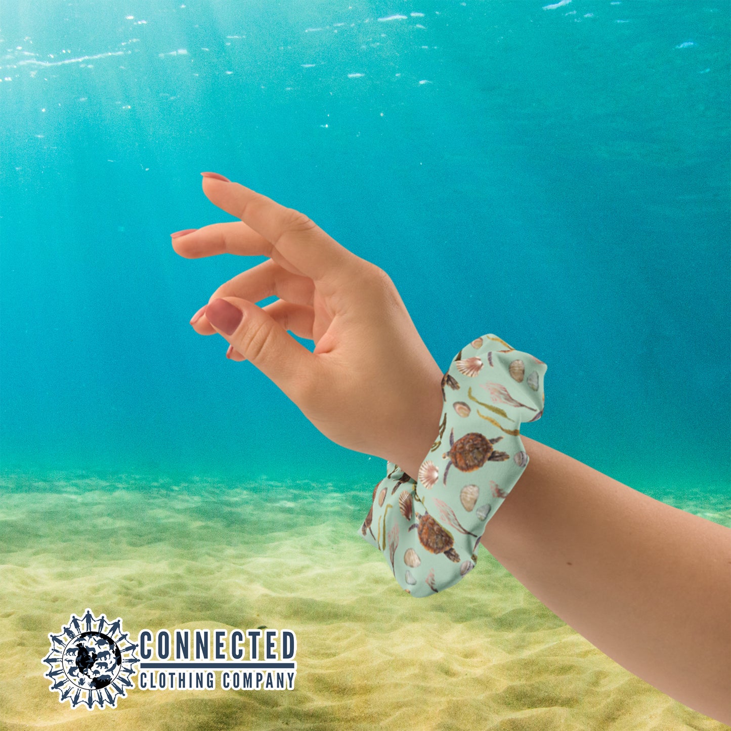 Sea Turtle Scrunchie On A Wrist - sweetsherriloudesigns - Ethical & Sustainable Apparel - 10% donated to save the sea turtles