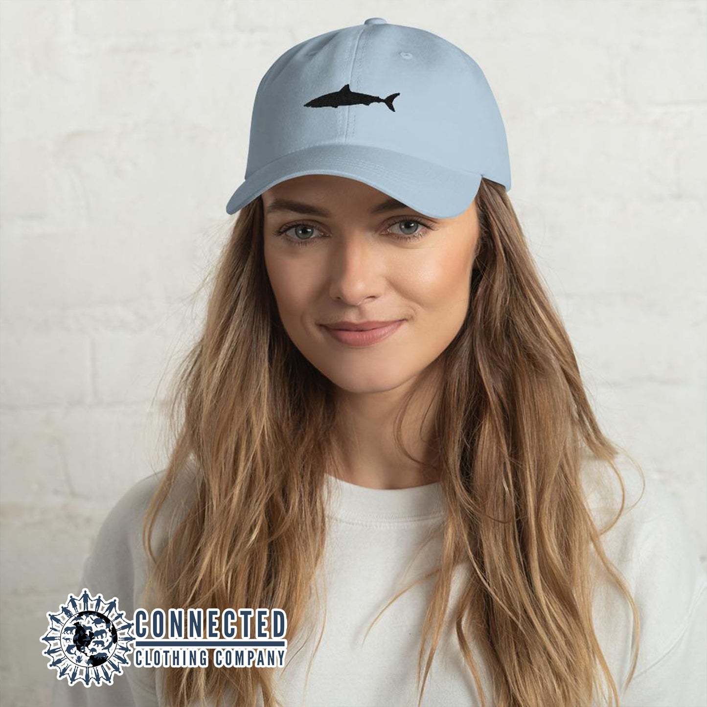 Model Wearing Blue Shark Cotton Cap - architectconstructor - Ethical & Sustainable Clothing That Gives Back - 10% donated to Oceana shark conservation