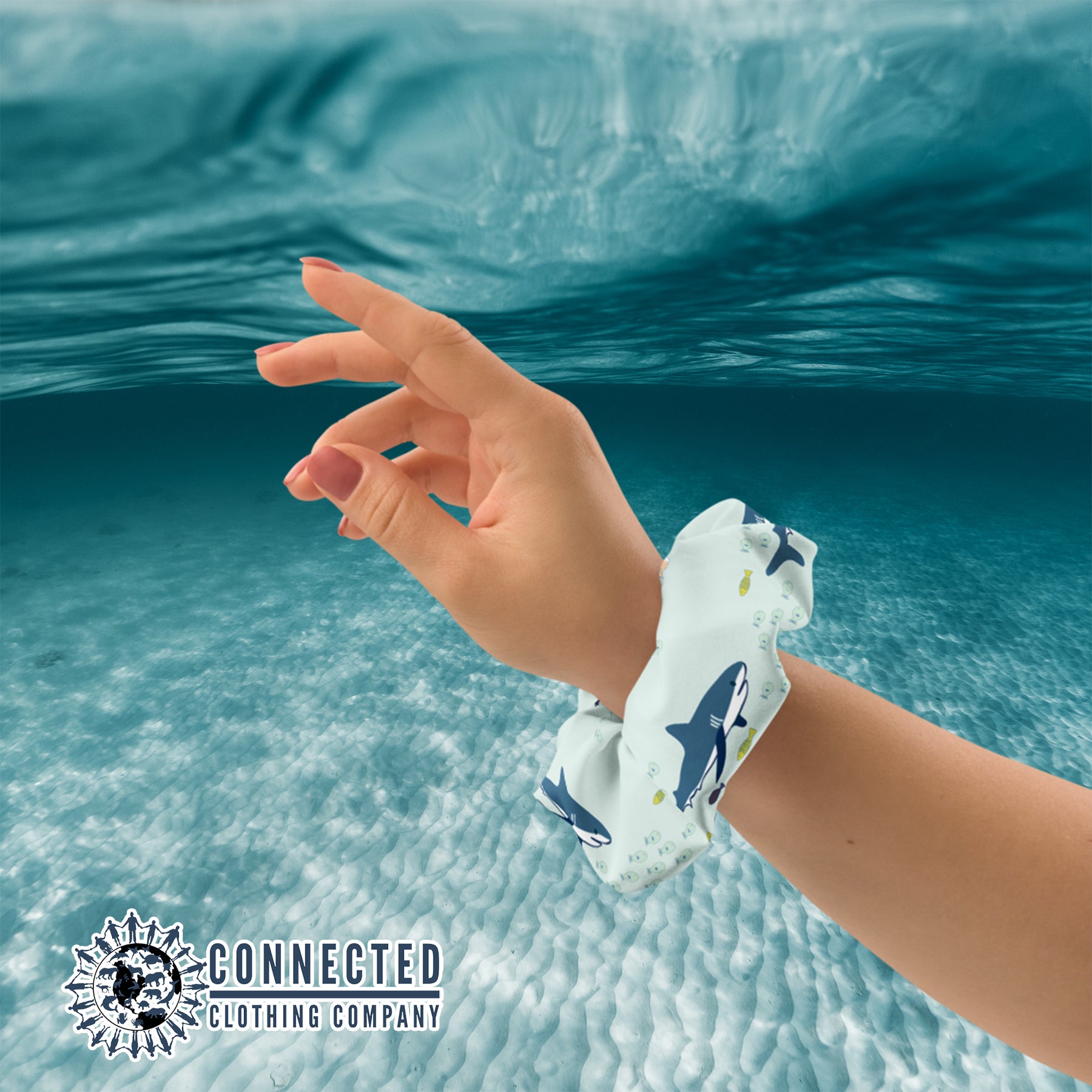 Wrist Holding Shark Scrunchie in Light Color - sweetsherriloudesigns - Ethical & Sustainable Apparel - 10% donated to save the sharks