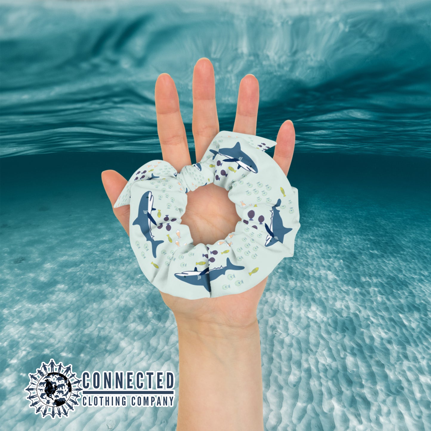 Hand Holding Shark Scrunchie in Light Color - sweetsherriloudesigns - Ethical & Sustainable Apparel - 10% donated to save the sharks