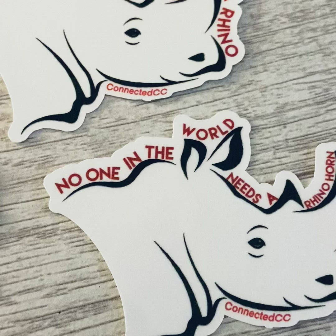 White No One Needs A Rhino Horn Sticker reads "No One In The World Needs A Rhino Horn Except A Rhino" - sweetsherriloudesigns - Ethically and Sustainably Made - 10% donated to Save The Rhino International