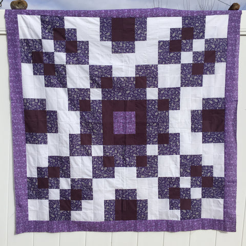 Violet Burst Quilt Pattern in purples.