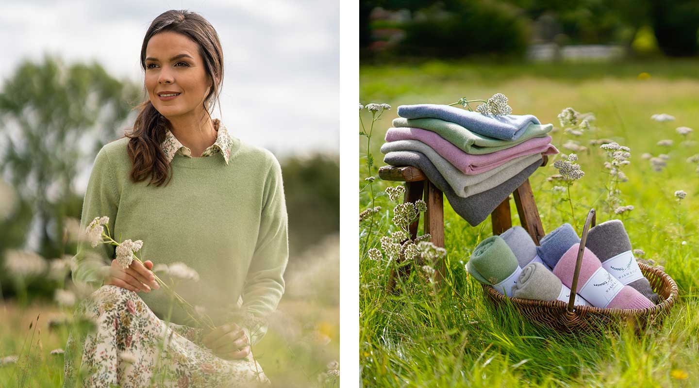 action shots from photoshoot basket full of cashmere scarves and cashmere jumper in grasses