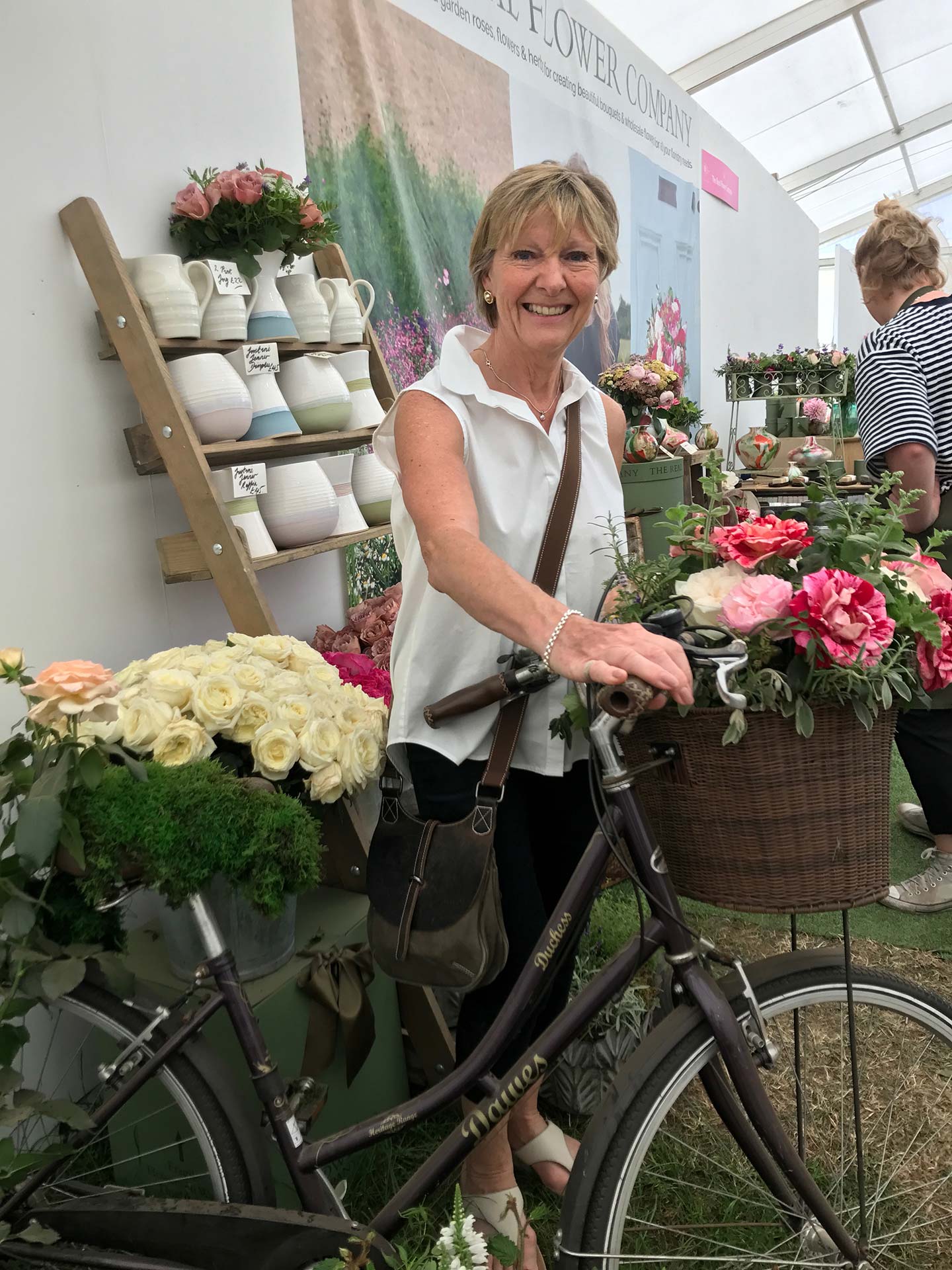 chris on a bike at a summer fair