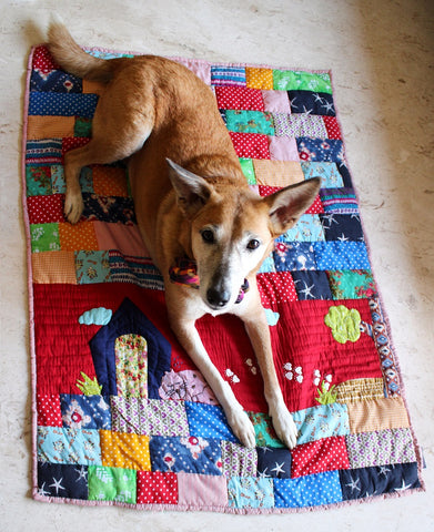 Lana Paws red patchwork dog mat