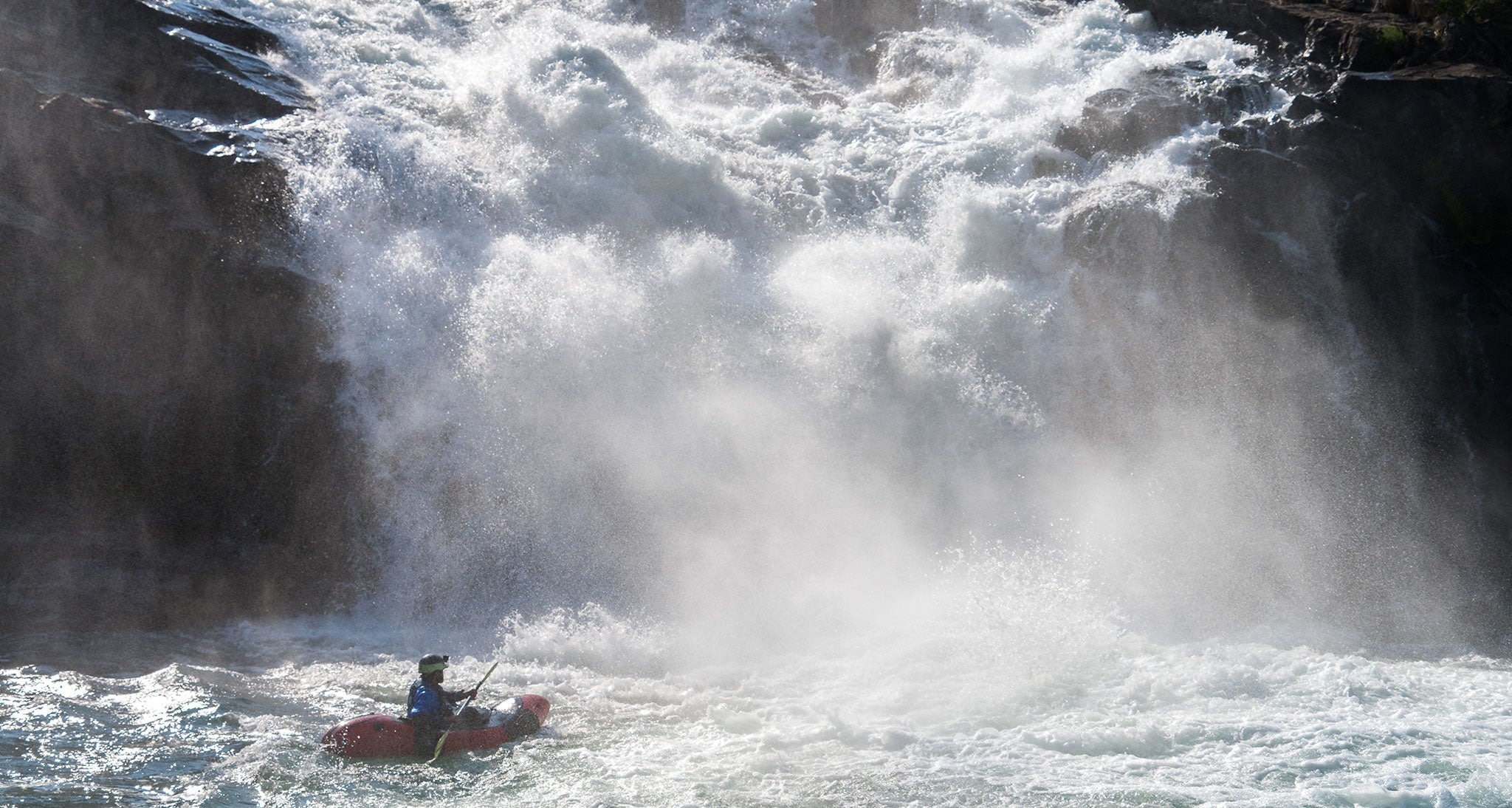 Success, paddler safely below the waterfall