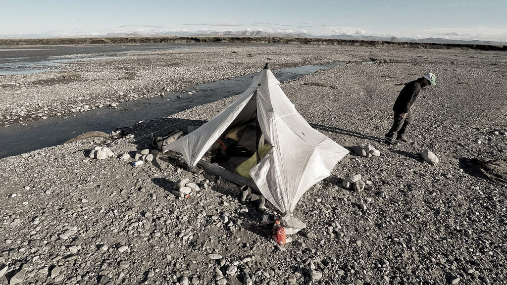 Gravel bar camping in ultralight tent shelter