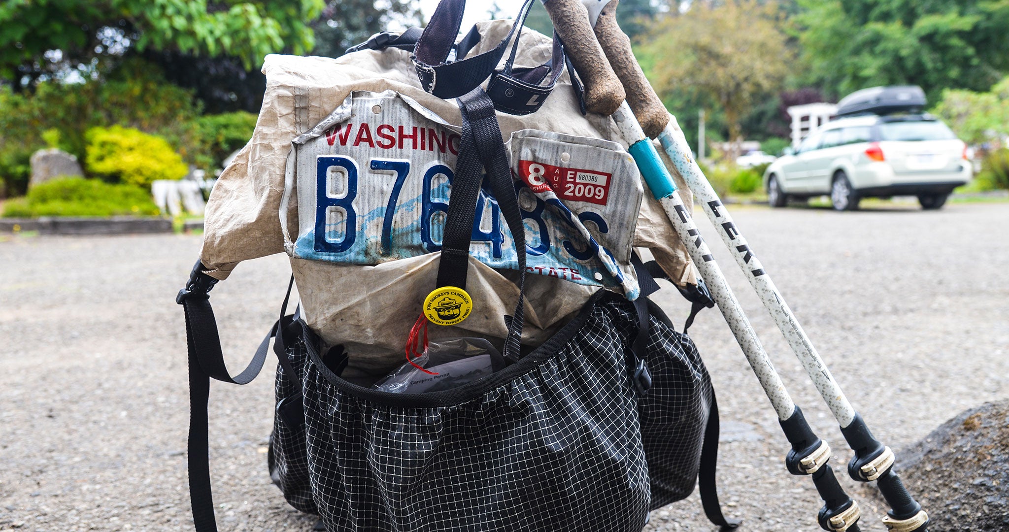 Ultralight backpack with damaged Washington license plate attached