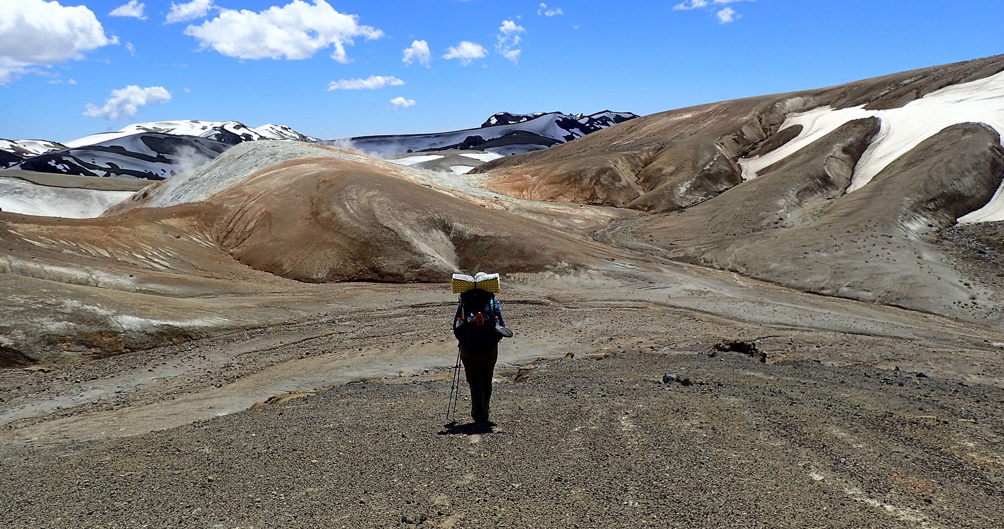Ultralight backpacking through rock fields just north of the Central Chilean volcanoes.