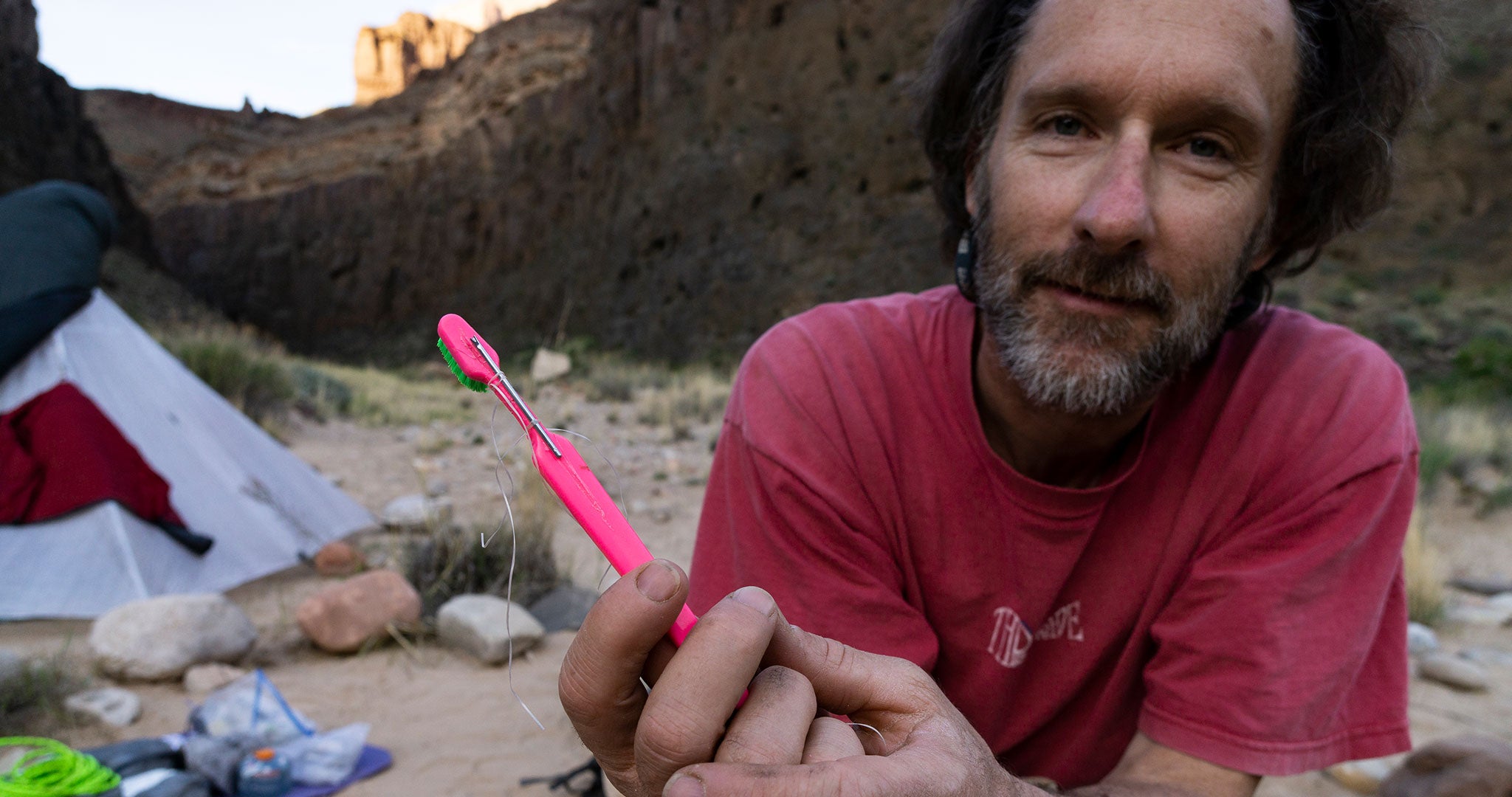 Clay Wadman showing off his repaired toothbrush