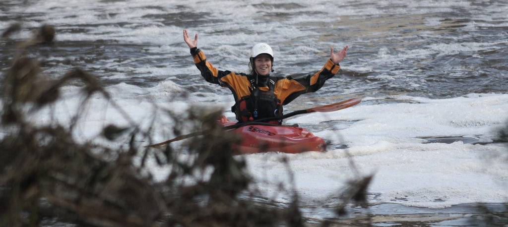  Woman Whitewater Packrafting and celebrating