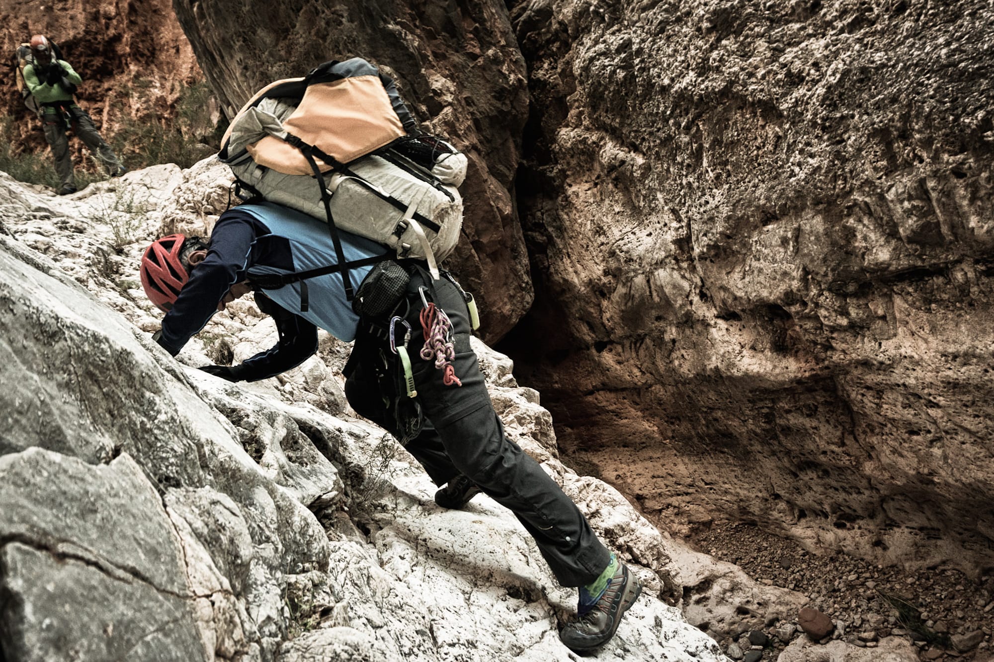 Ambassadors Moe Witschard and Rich Rudow down climbing through remote canyons.