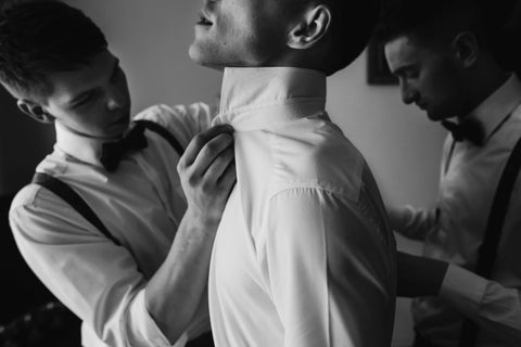 Buttoning_shirt_on_morning_of -wedding