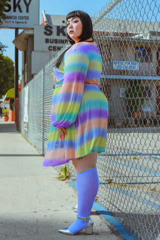 plus size model wearing proud mary fashion dress and we love colors knee-high socks