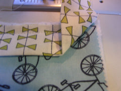 sewing binding onto quilt