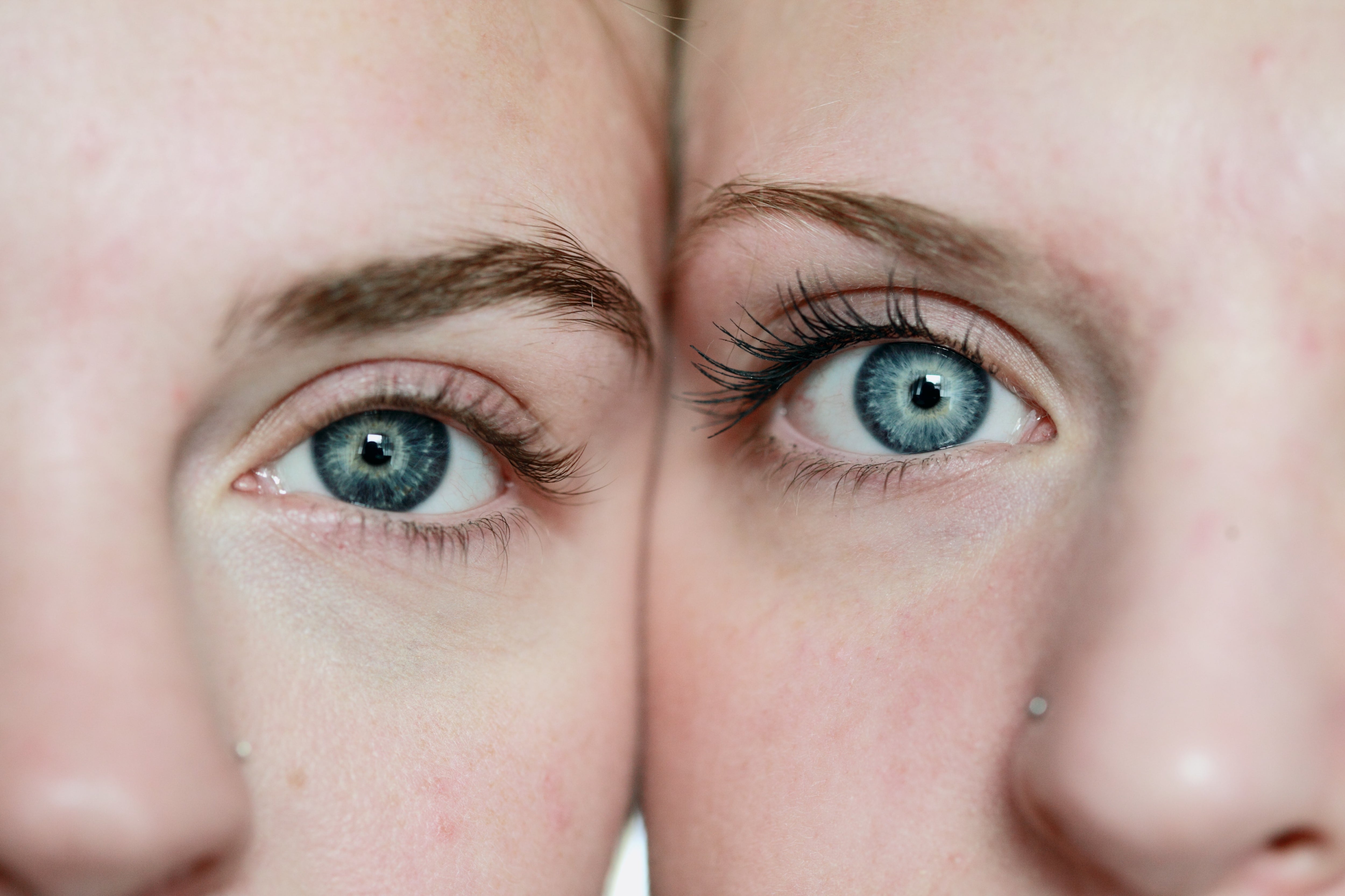 Close-Up of Two Siblings Faces With The Focus on Their Eyes