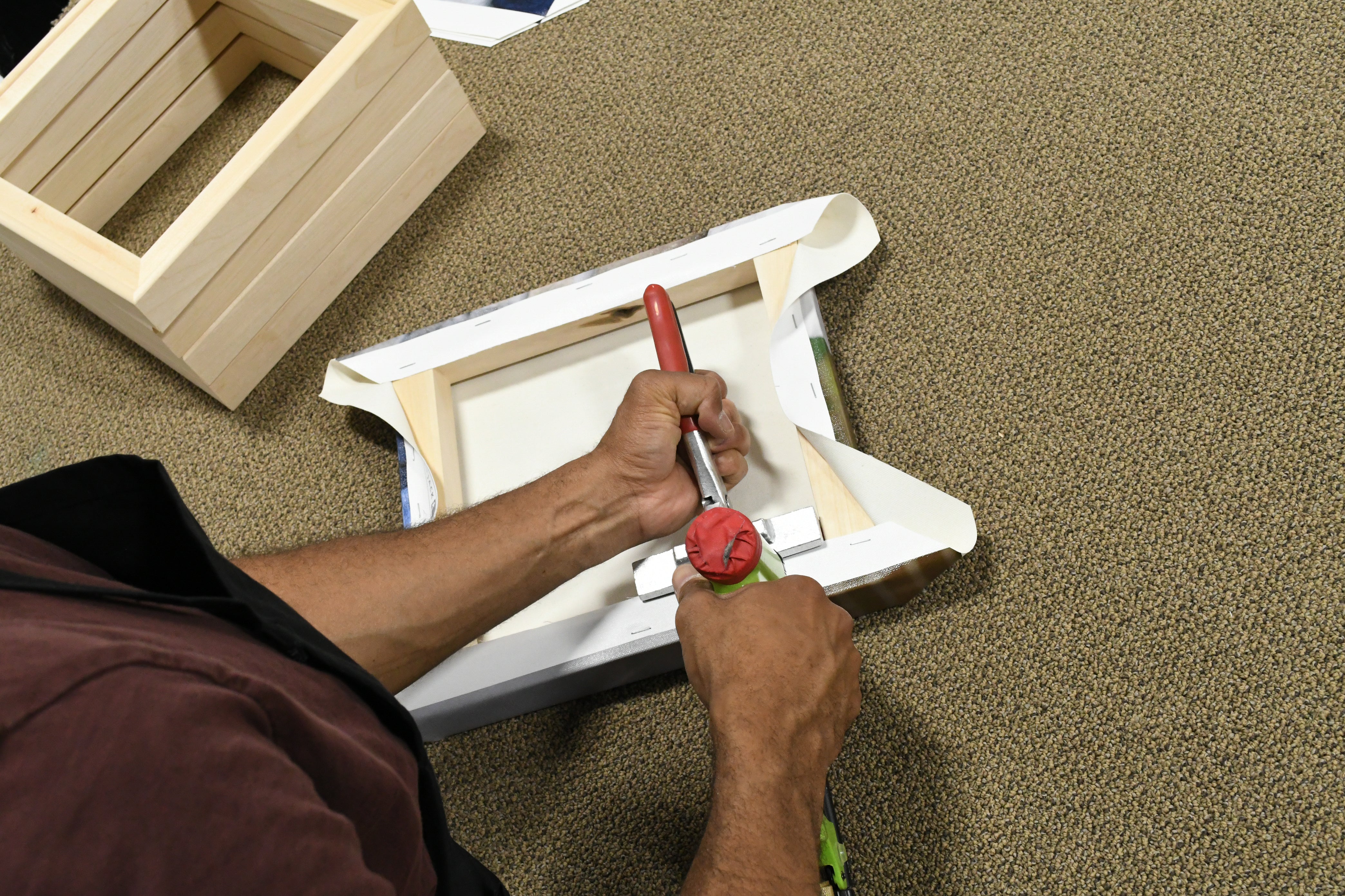 Quality handcrafted Posterjack Canvas Print being expertly hand-stretched 