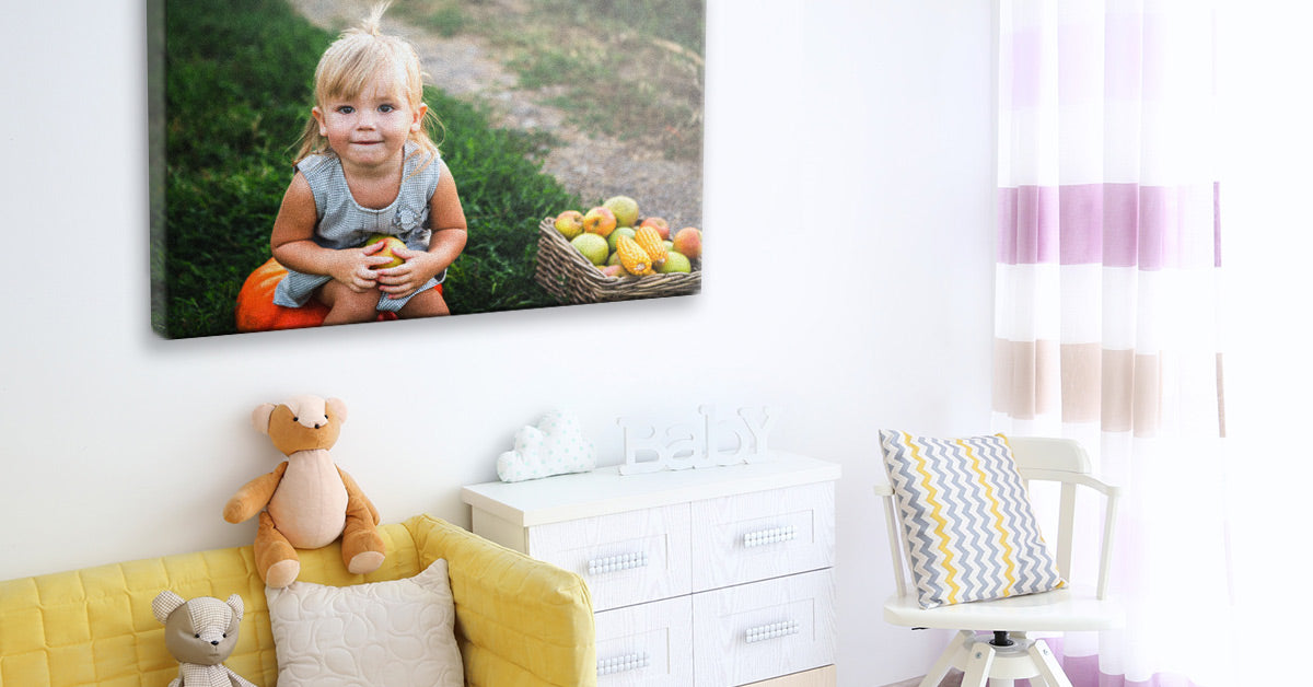 Photo of a child printed on canvas by Posterjack on display in a room