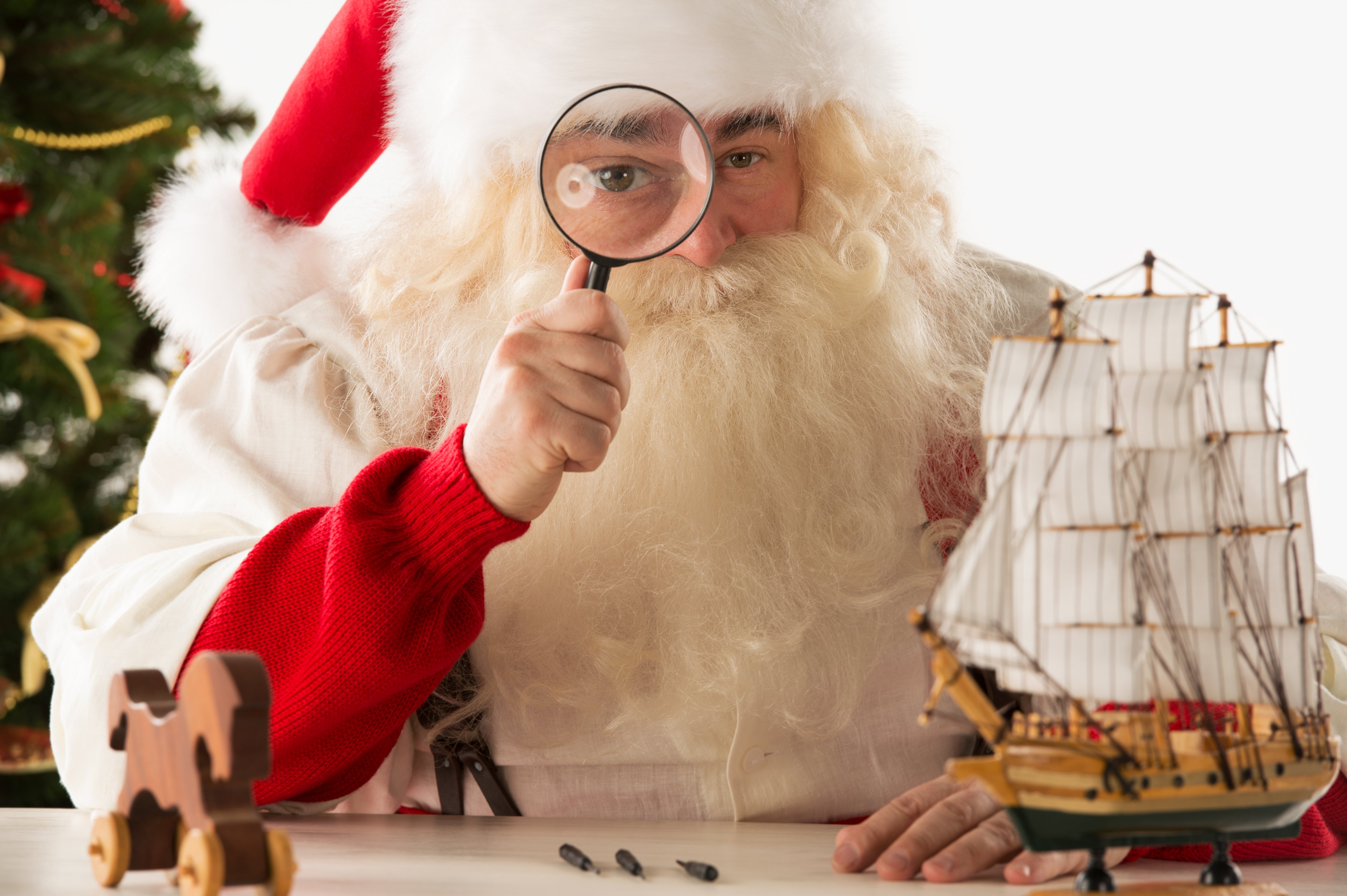 Santa with Magnifying Glass