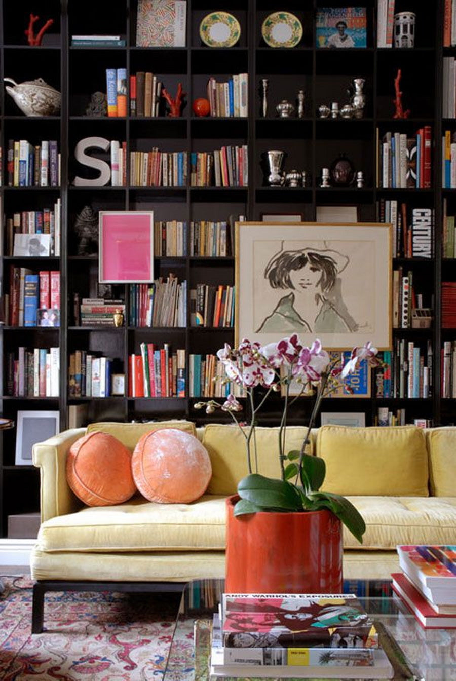 Displaying art on bookshelves