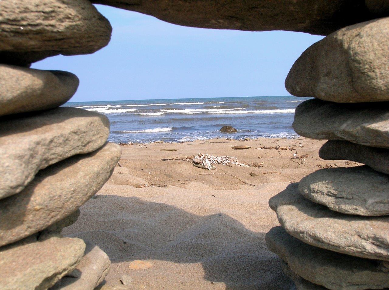 Ocean landscape framed with beach stones
