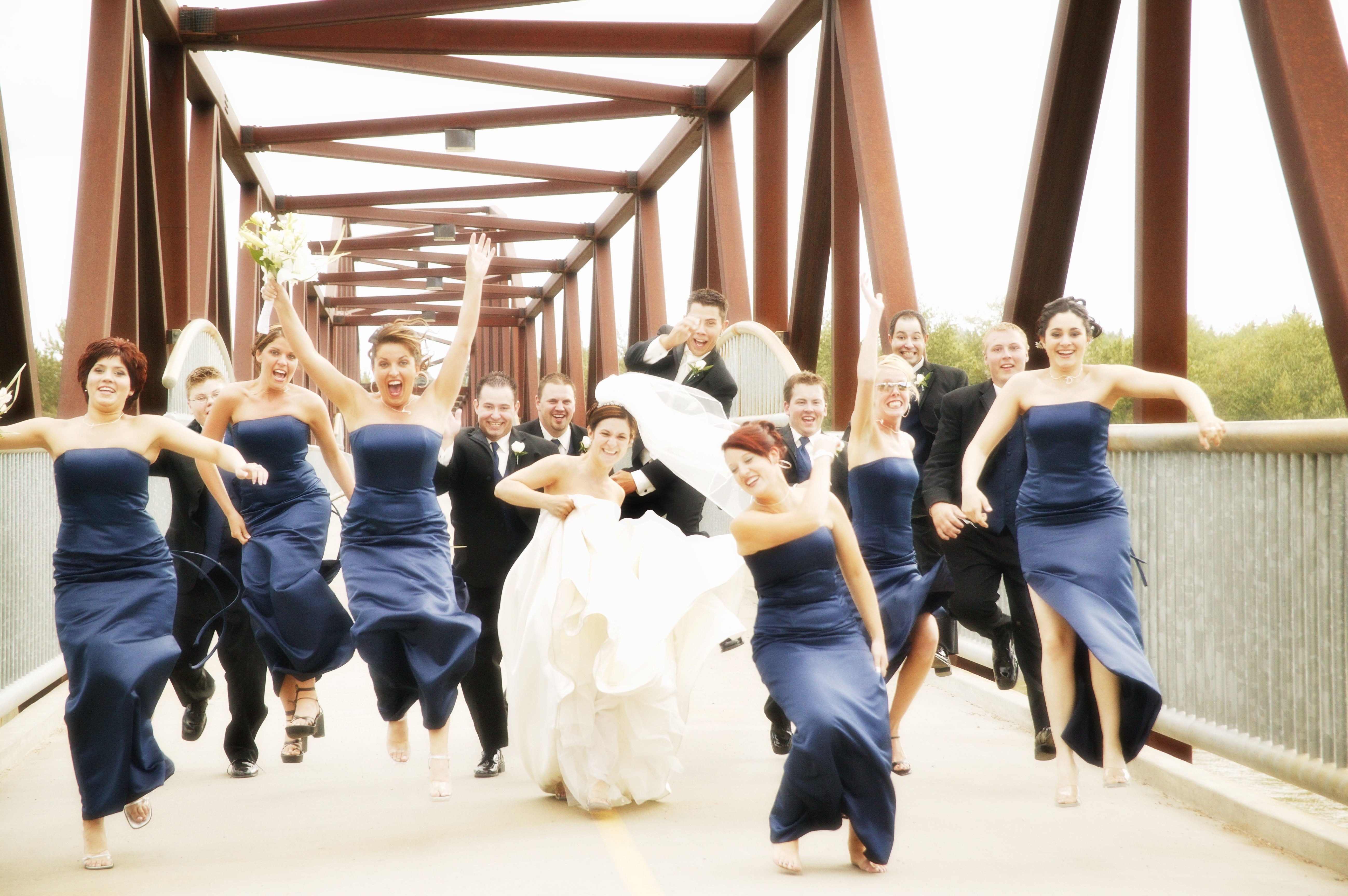 Photo of wedding party having fun and being silly