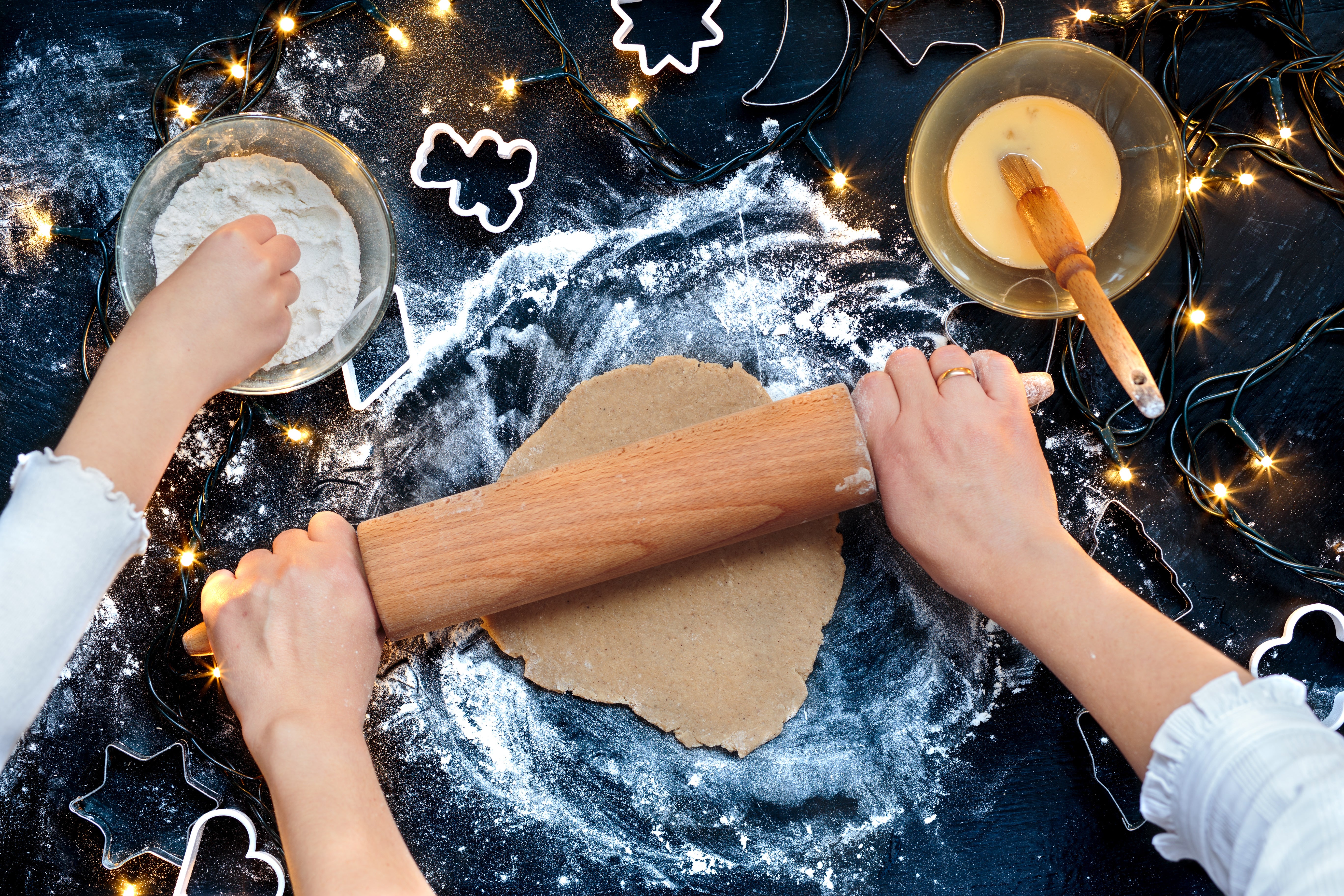 Two people making holiday treats - captured from a unique perspective, example of holiday photography