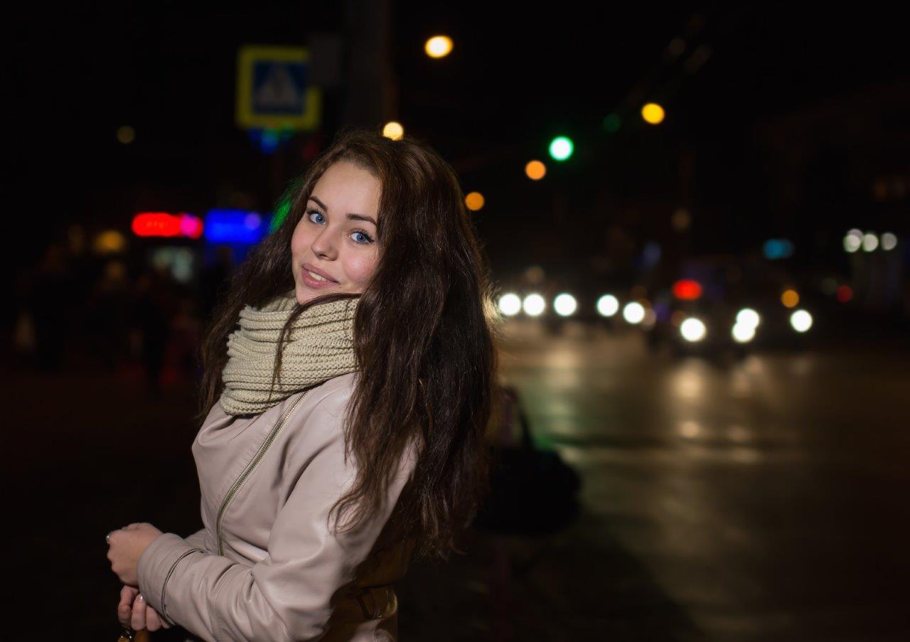 Night portrait of a woman in the city - understanding your digital camera's scene modes