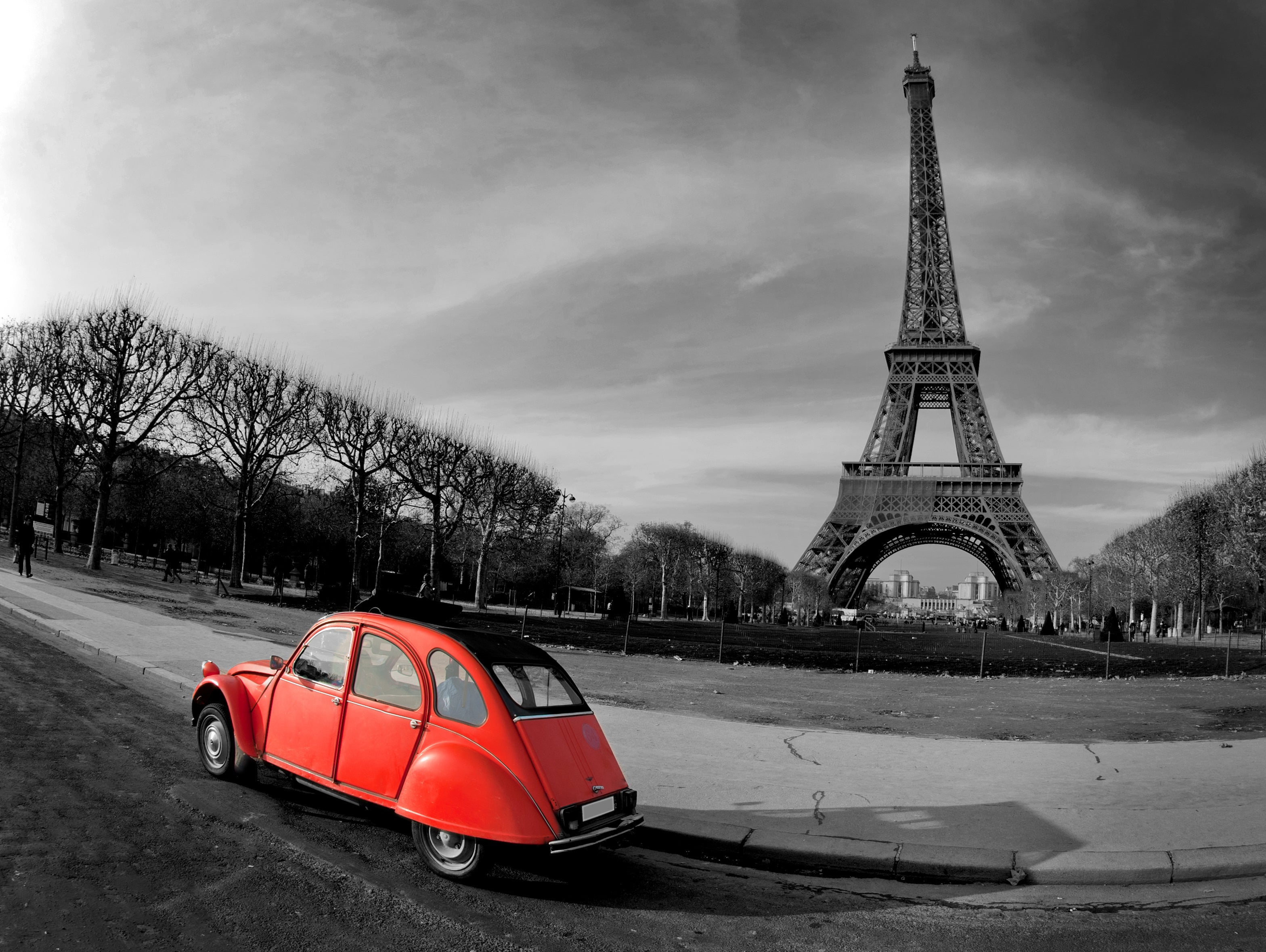 Eiffel Tower and red car in Paris