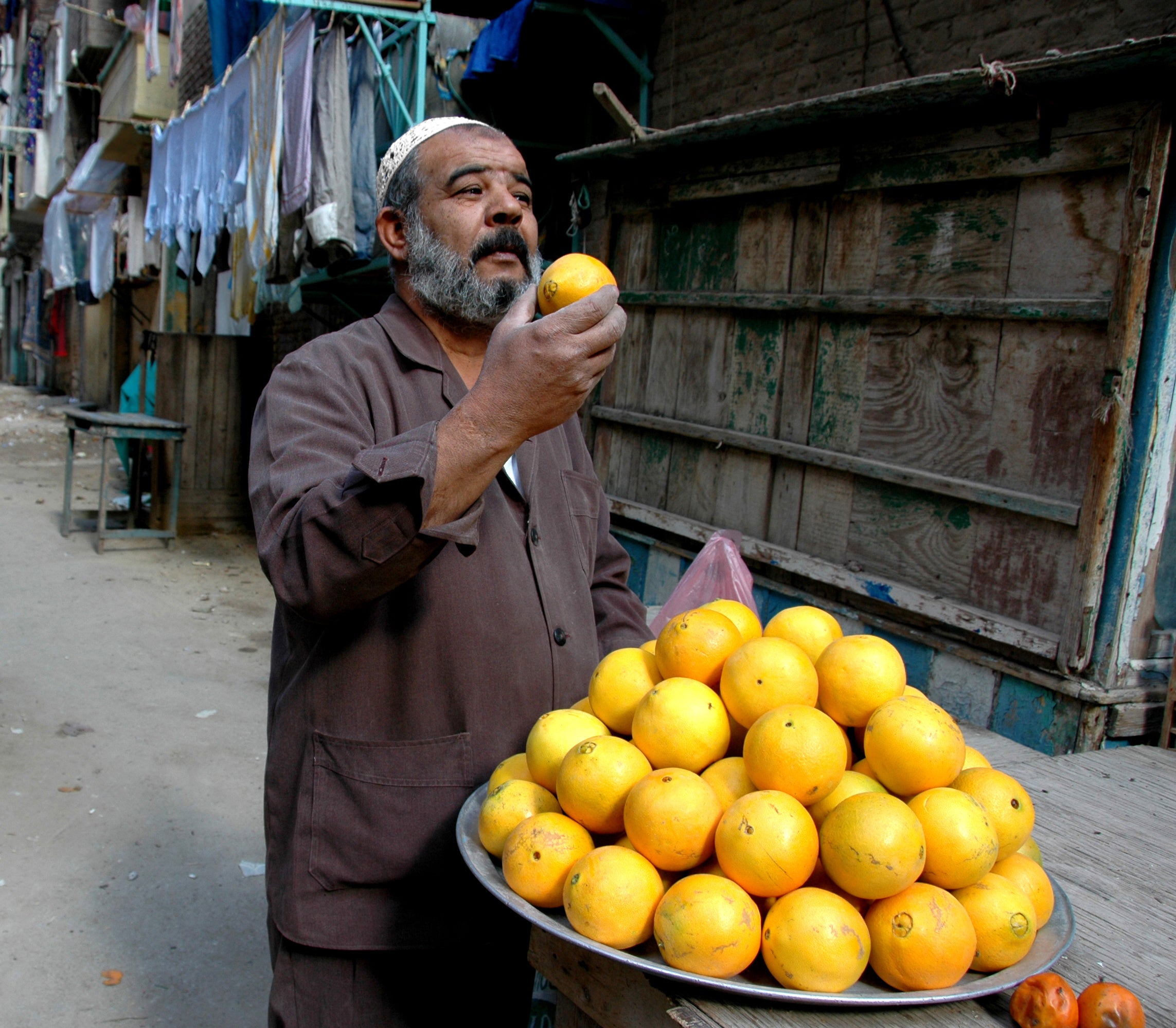 Man selling fruit on the streets of Egypt