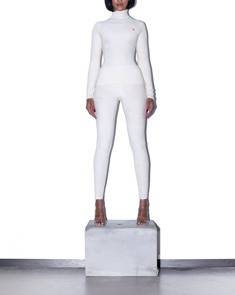 Model wears XS KOOTCH Towelling Base Layer Leggings in Buttermilk by TheKLabel (overview)