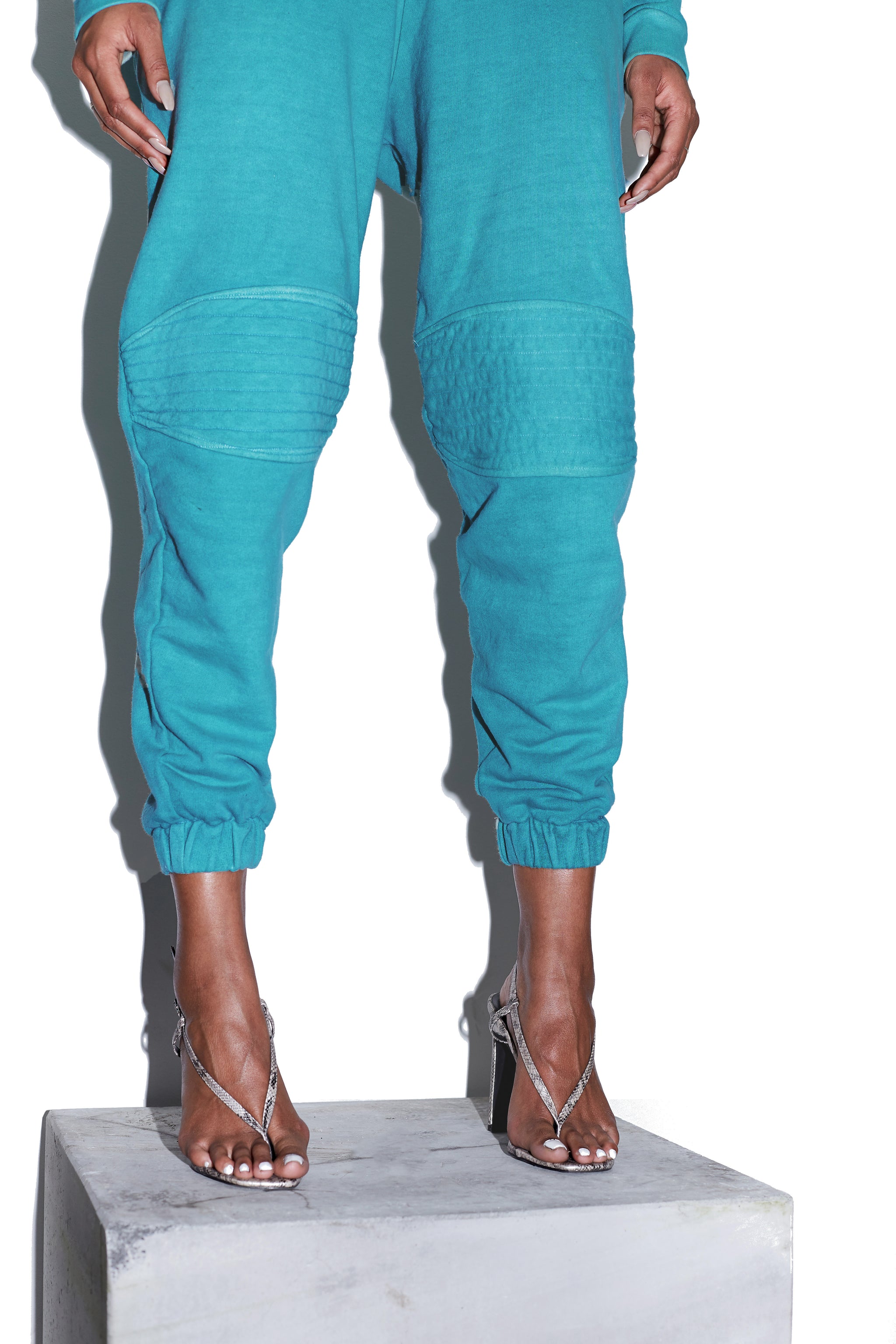 Model wears SIZE X-SMALL TONIK Slouch Panelled Joggers in Azure Blue by TheKLabel