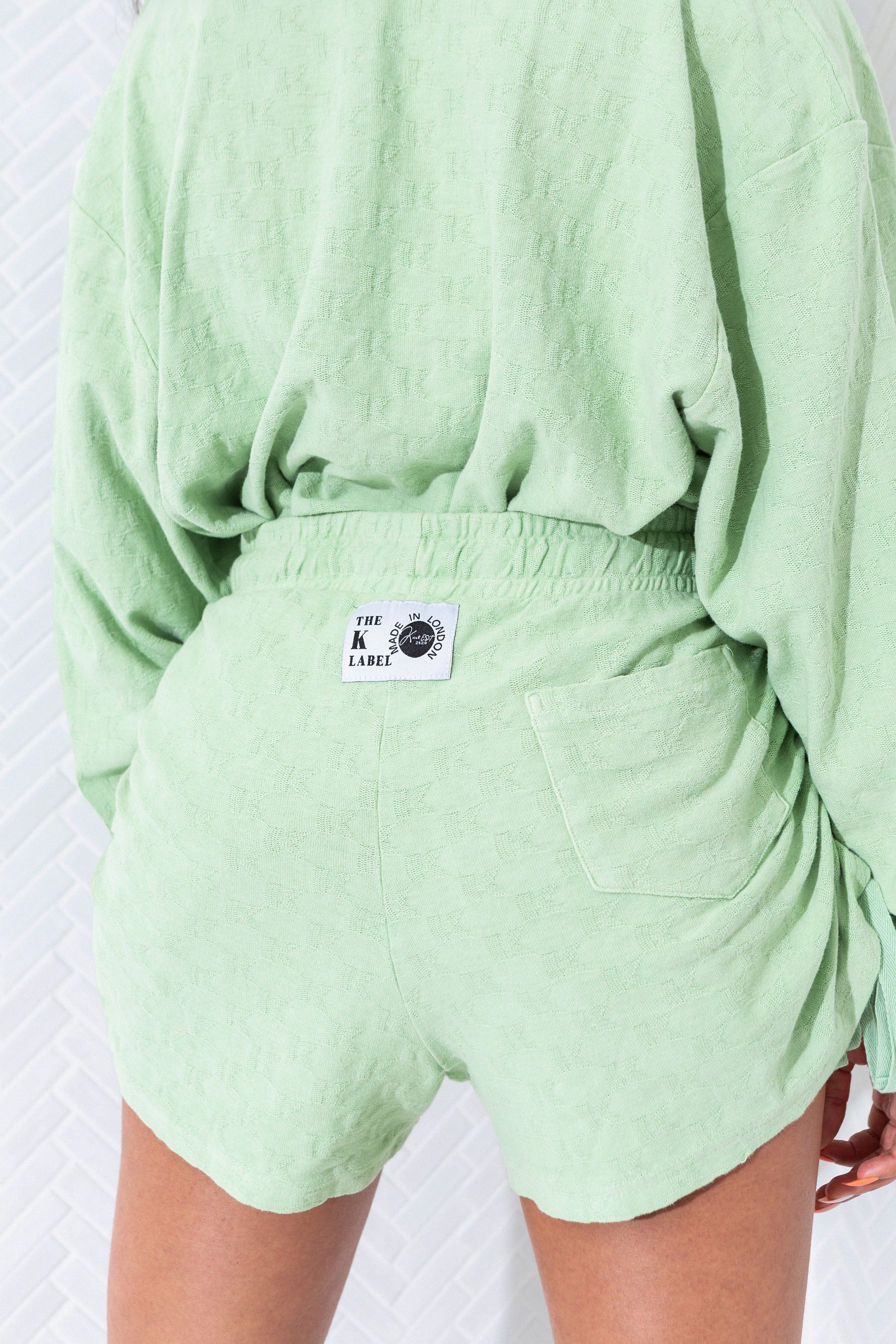 KOTTONS Stamped Ruched Shorts in Matcha Green